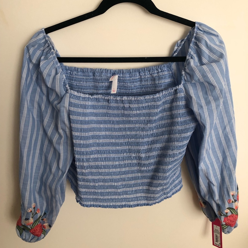 blue and white striped crop top with floral detail